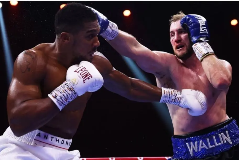 Anthony Joshua Triumphs Over Otto Wallin, but Deontay Wilder’s Shock Defeat Derails Long-Awaited Showdown