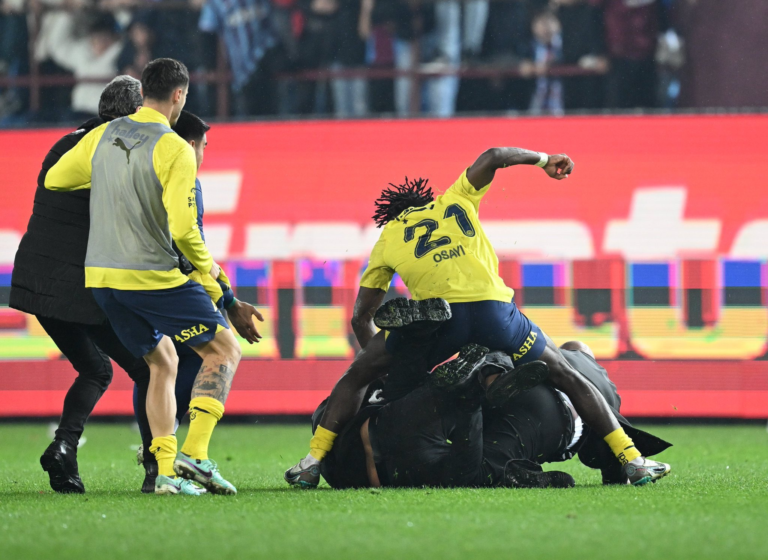 Bright Osayi-Samuel Defends Teammates Against Pitch Invaders in Chaotic Scene