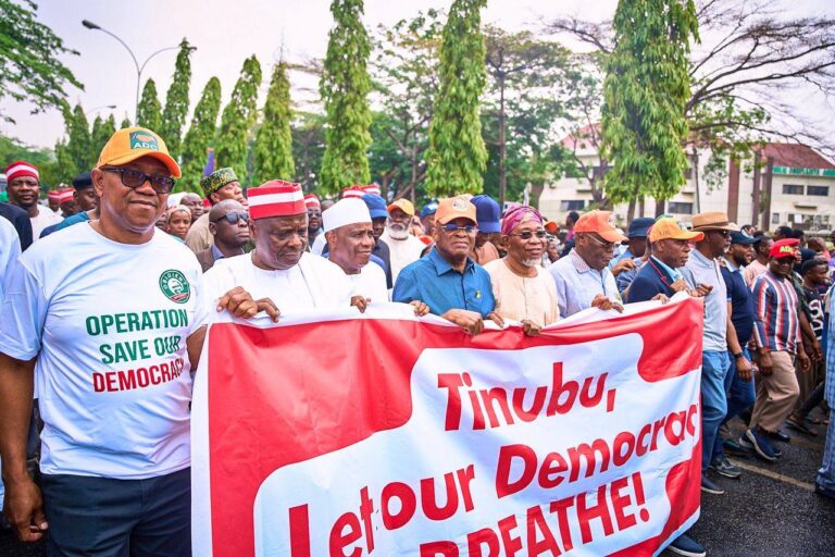 ADC Takes Protest to INEC Headquarters, Mark Insists Situation Is Under Control